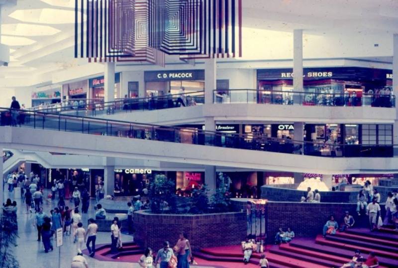 A mid-70’s view of the Grand Court at Woodfield Mall in Schaumburg, Illinois